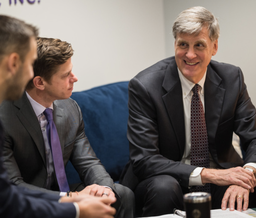Peter O'Keefe and Justin Stevens meeting with a client at O'Keefe Stevens Advisory